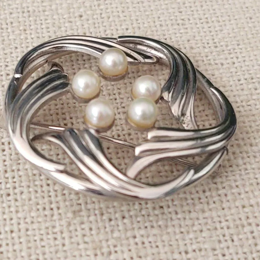 Vintage Simmons sterling and pearl brooch